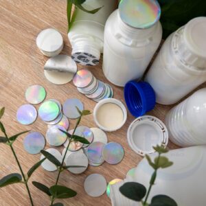 Seal chất liệu HDPE -PE cấu trúc lớp giấy For trên nắp làm kính khi sử dụng chai lọ nhiều lần