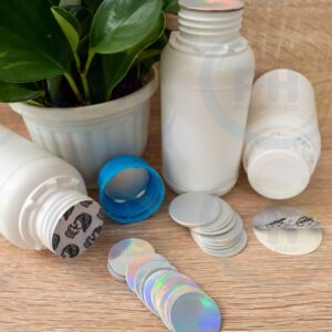 Seal chất liệu HDPE -PE cấu trúc lớp giấy For trên nắp làm kính khi sử dụng chai lọ nhiều lần